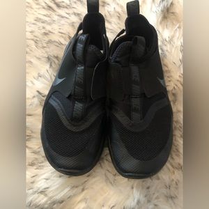 Boys all black Nike shoes